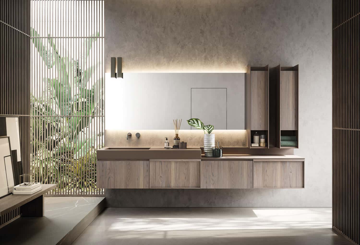 Smooth framed and plissé doors alternate in this design in Rovere Creta. Washbasin top in Brown matte Teknorit. Brown matte lacquer for the structure of the tall columns and the LED lamps over the Premium mirror.