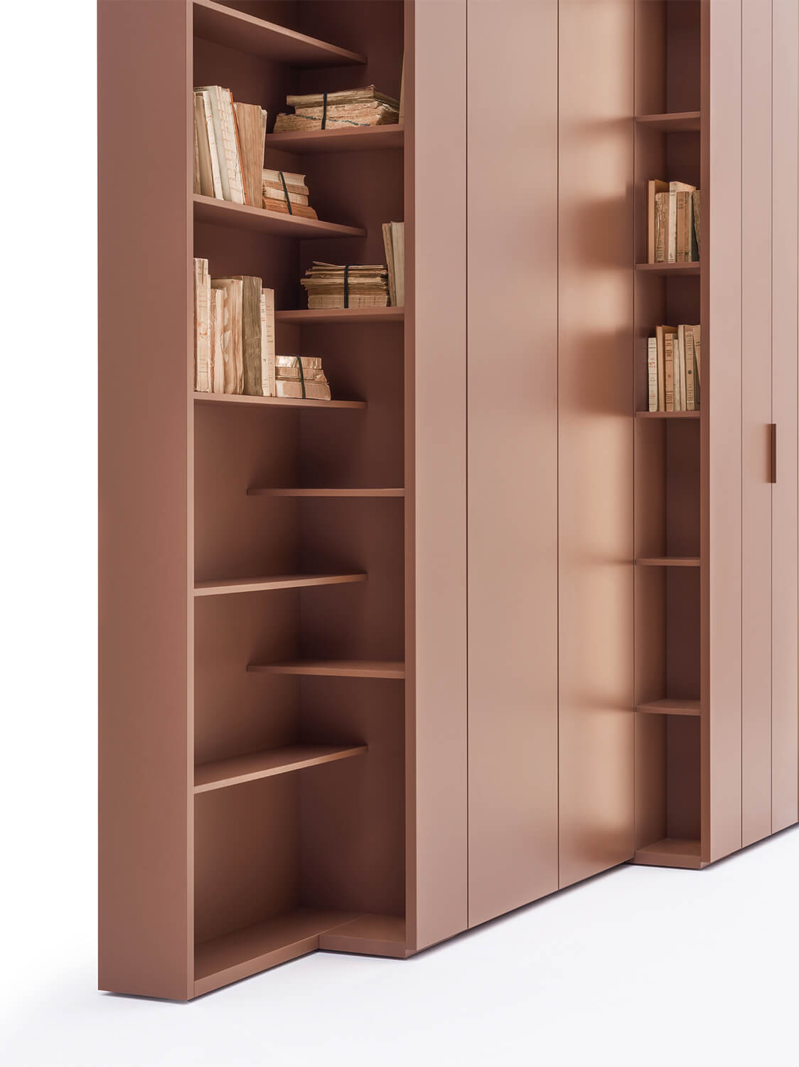 Detail of a Core closet using different depths and side modules to increase storage space.