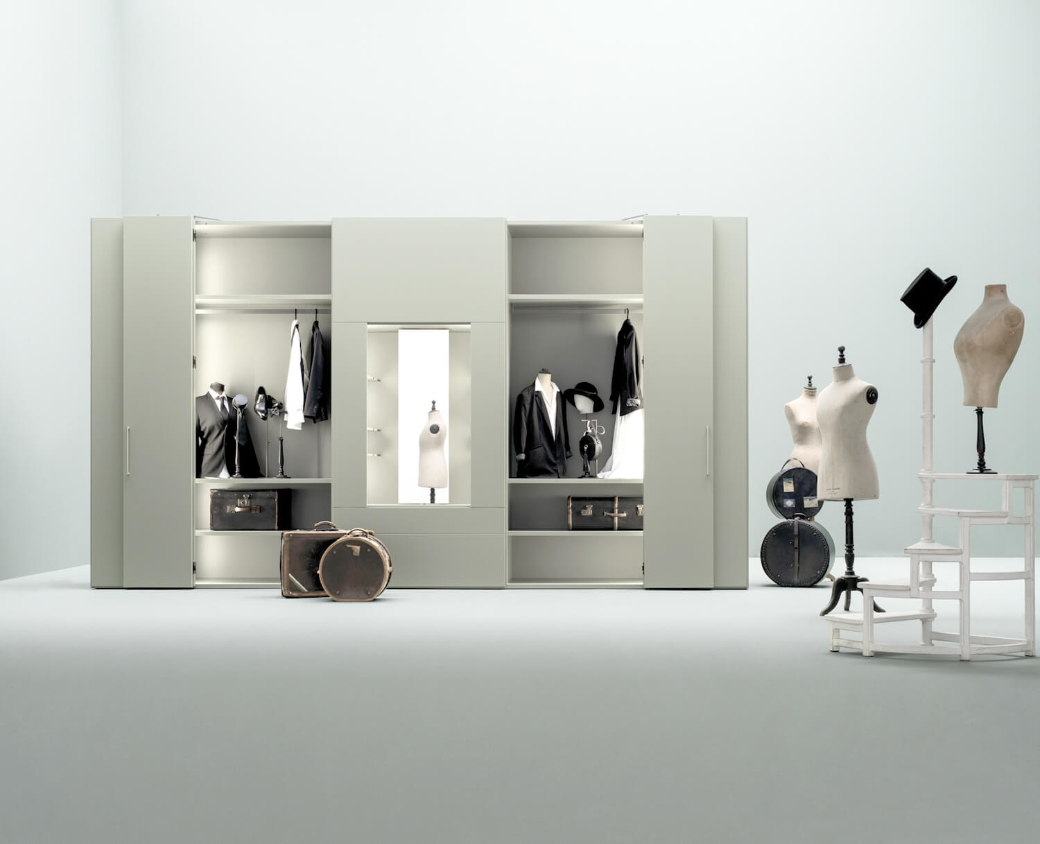 Roomy closet with mirror unit. The mirror, which is anchored at top and bottom, rotates 360 degrees to access its back storage pockets. 