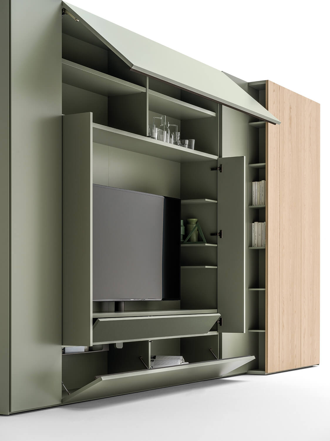 The Roomy TV module can come with or without the media compartment underneath the TV. The TV can sit on its own pedestal or be anchored to a rotating titanium base.