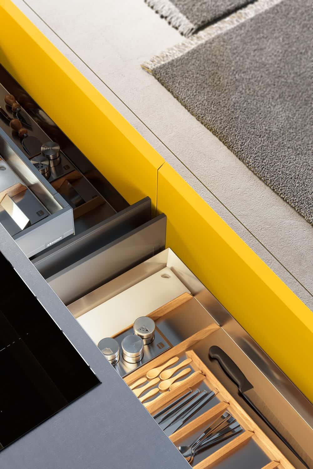 The Elite Line drawer accessories in Oak wood and stainless steel bring modern elegance to the interior of the kitchen.