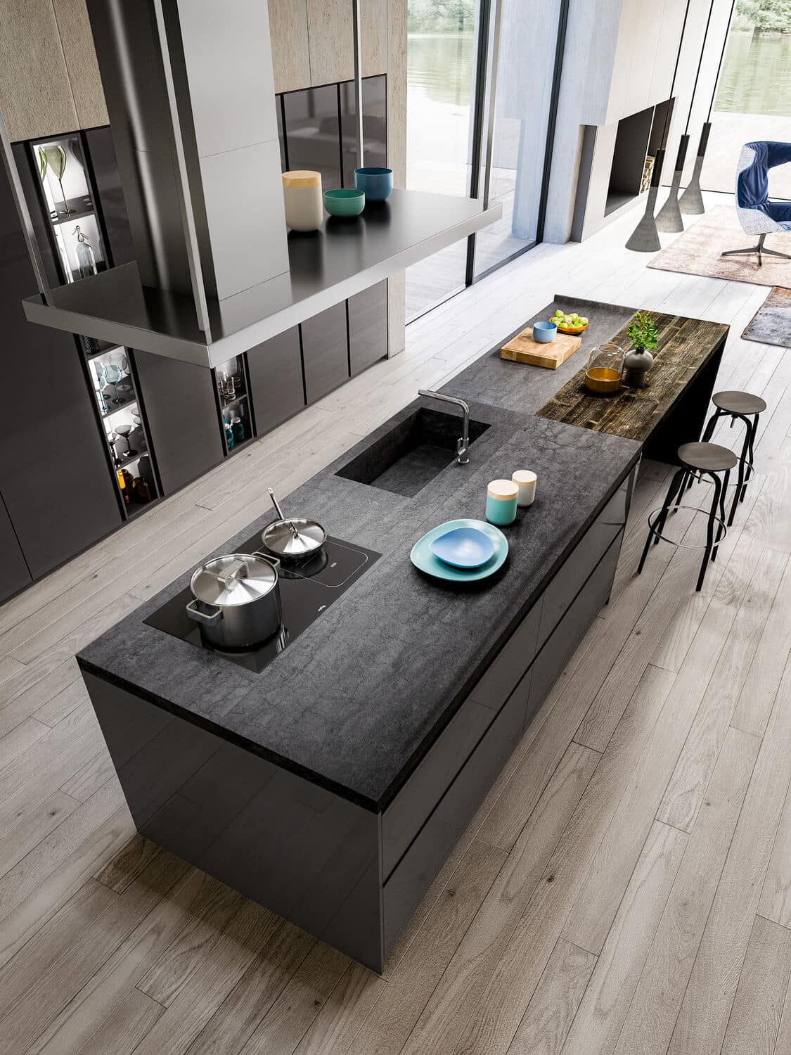 Island countertop in Antracite Laminam, with table in Old Abete Nero wood. 