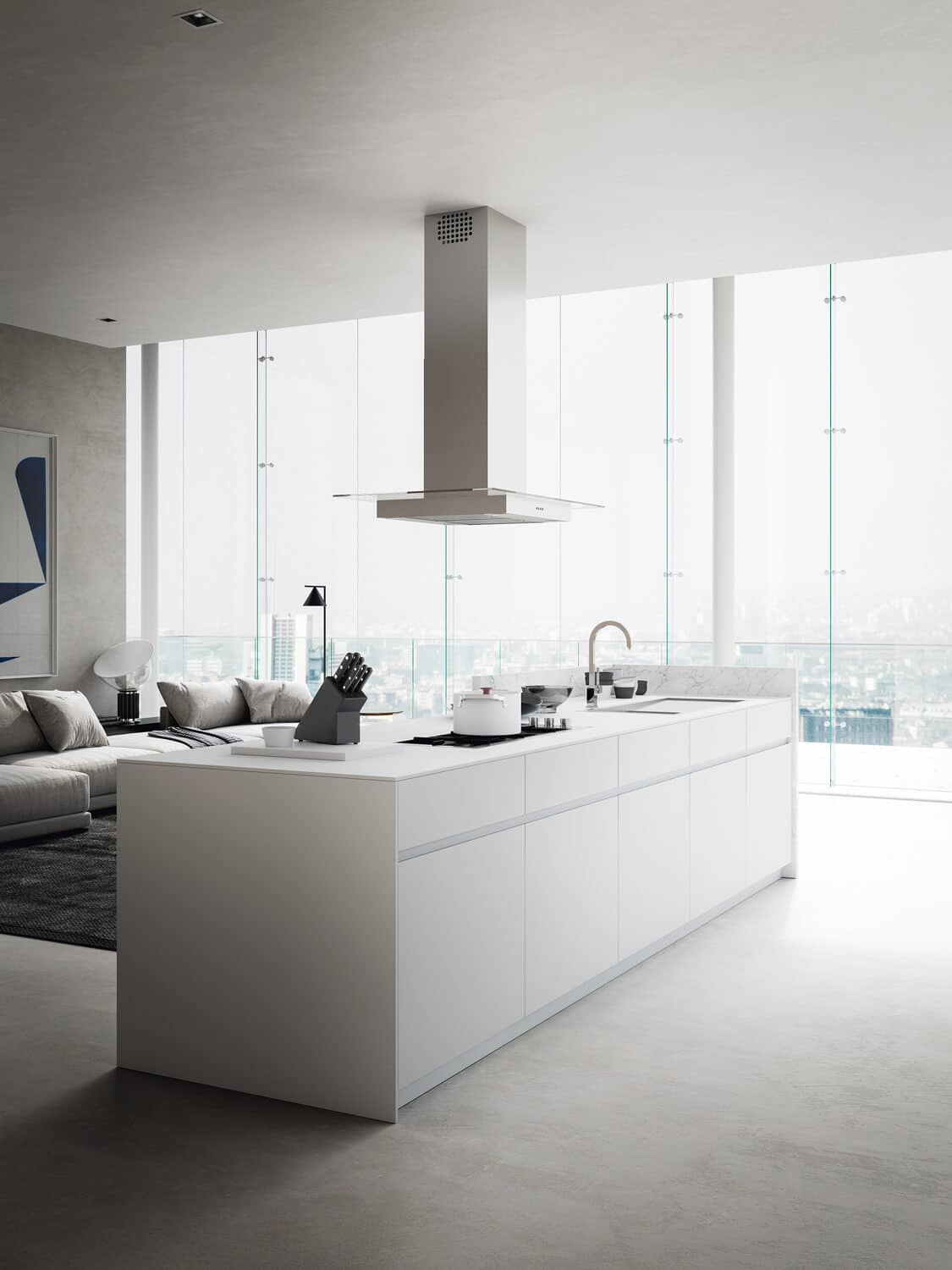The integrated channel in White painted aluminum creates a visual continuum with the cabinets. 