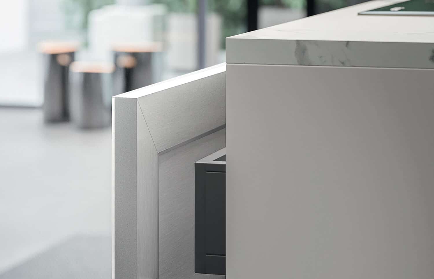 Detail of the T16 cabinet with aluminum framed door.