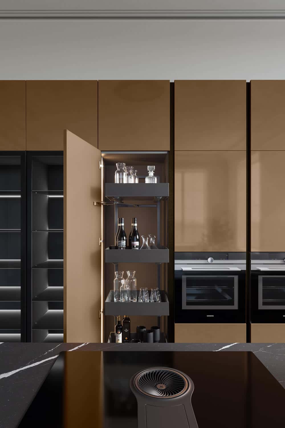 Tall units in the exclusive Bronzo Lux liquid metal lacquer, the result of a particular manufacturing process.