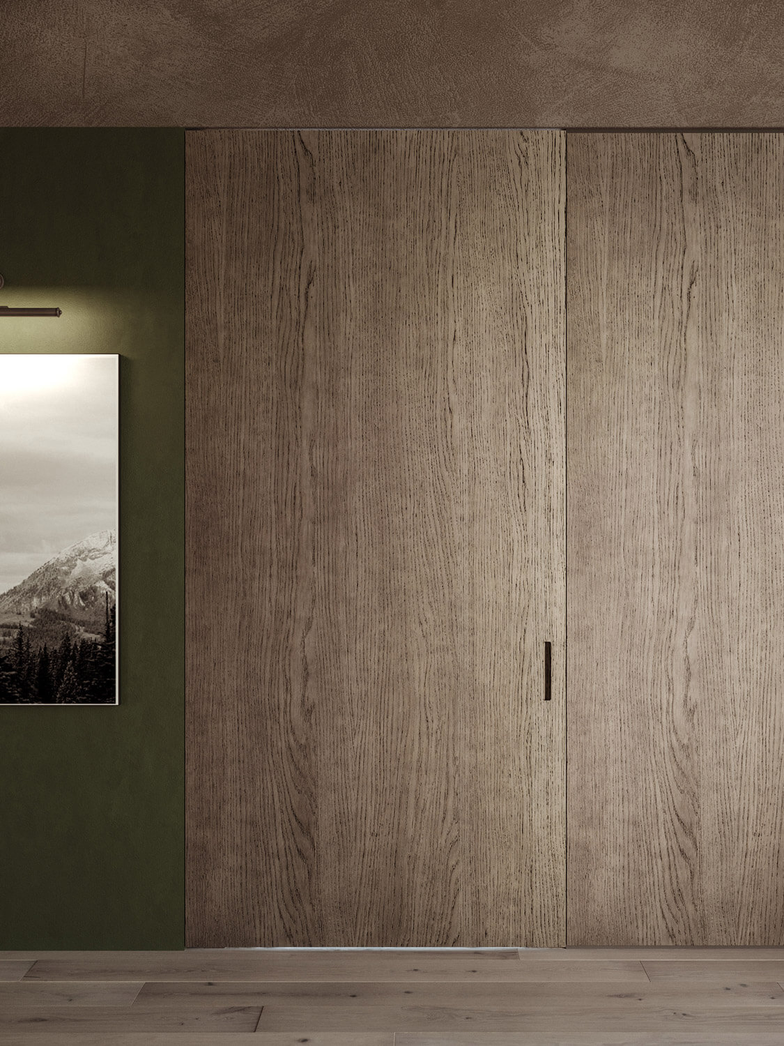 When closed, the pivot door integrates seamlessly with the surrounding wall in the same finish (shown: Graphite oak)