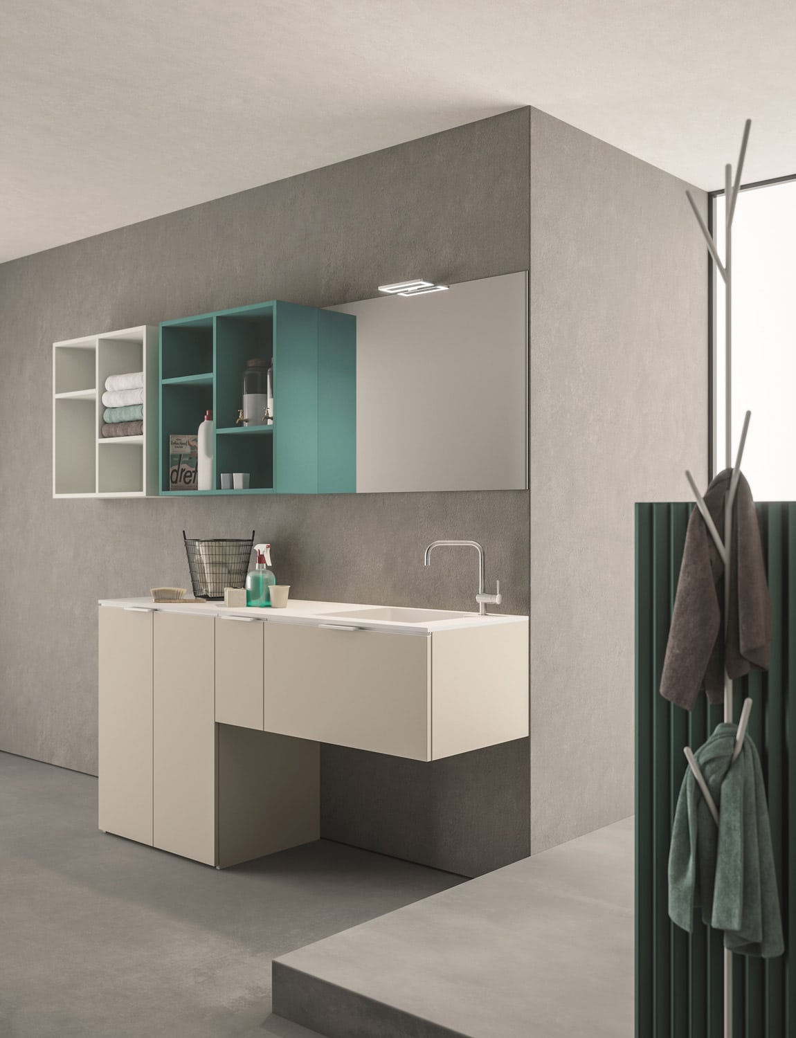 Base cabinet and floating drawers in Sabbia matte lacquer. Open shelving units in Menta Turchese and White matte lacquer. Towel holder tree in white lacquered steel. 