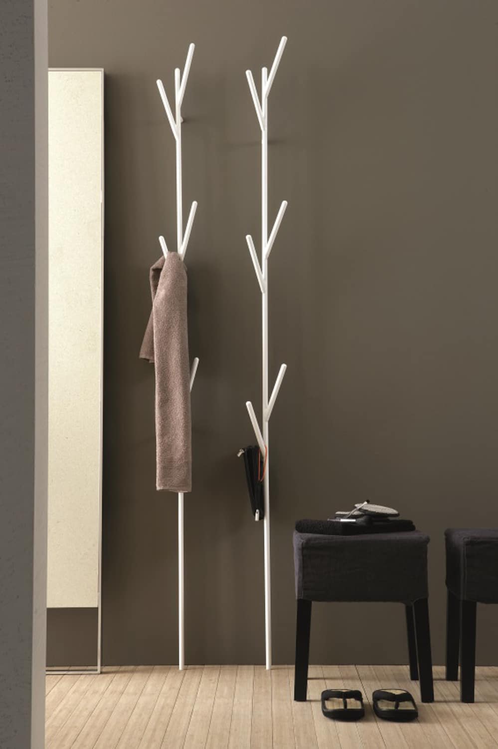 Towel holder trees in matte white steel.
