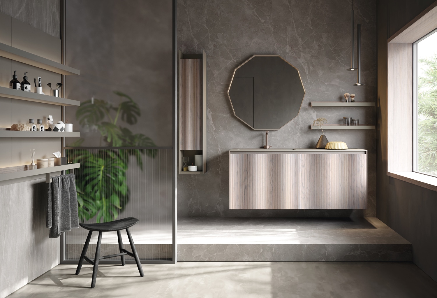 Vanity with plissé doors in Rovere Creta. The door of the tall column is in the same finish, with a structure in Piombo matte lacquer. The ten-sided mirror adds visual variety and its frame in Piombo matte lacquer brings this luxury bath design full circle.  