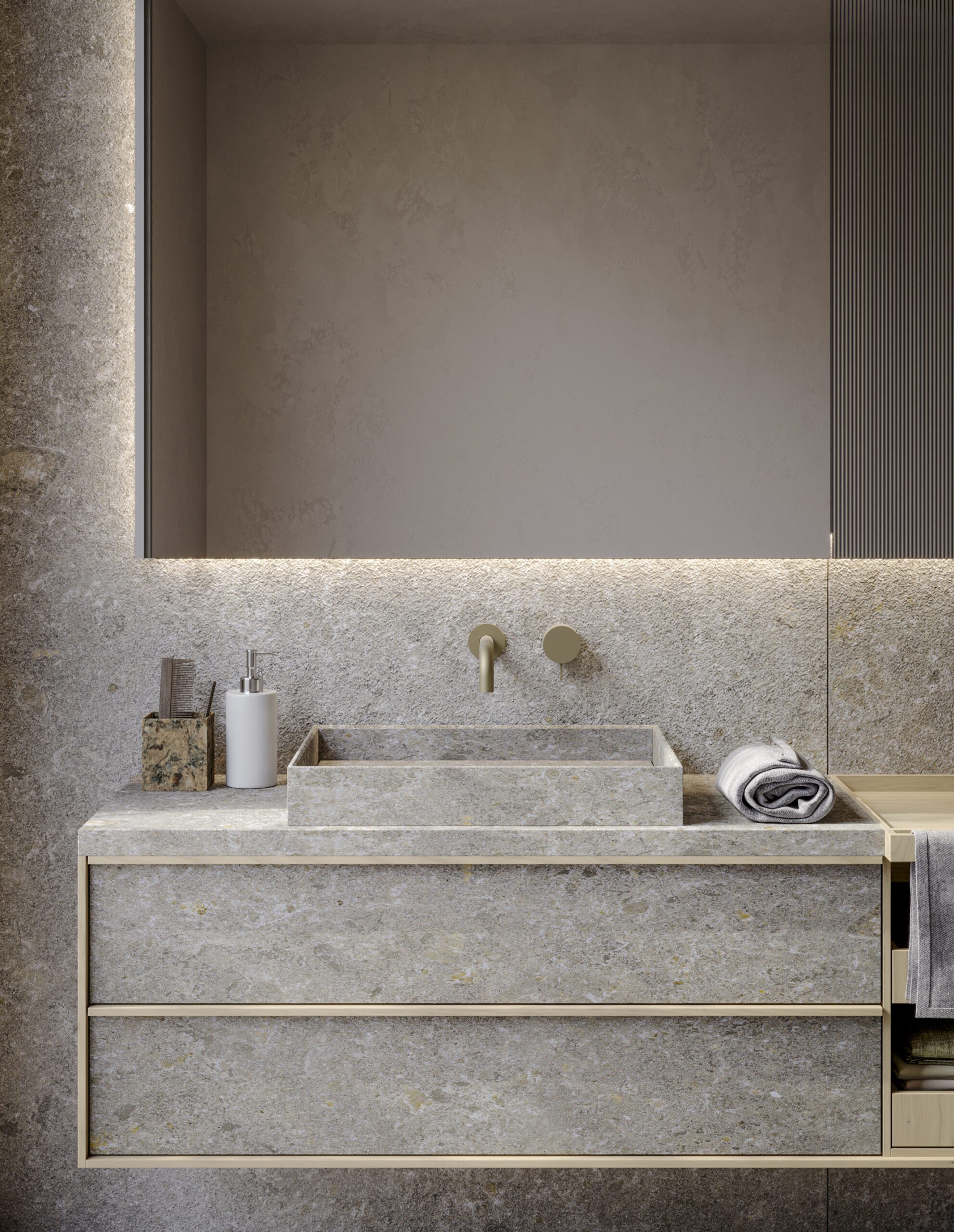 Sartus floating bath cabinet in Grès Meteora Gris bocciardato with matching washbasin and top. The monolithic look is made even more elegant by the delicate accent of the wooden frame in Rovere Avena, which defines the contours of the cabinet while functioning as handle.
