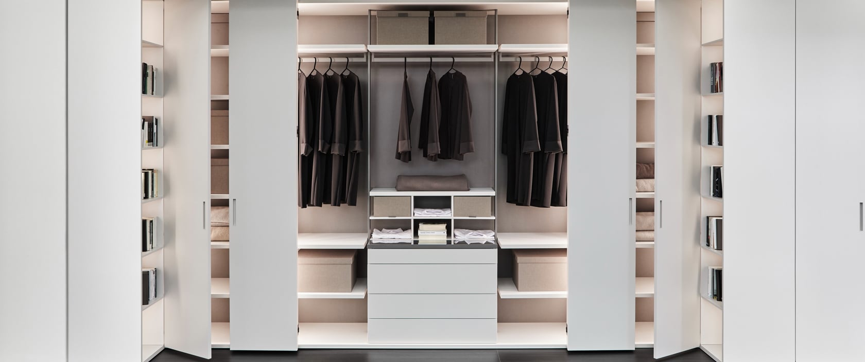 Large luxury white closet with customized modules