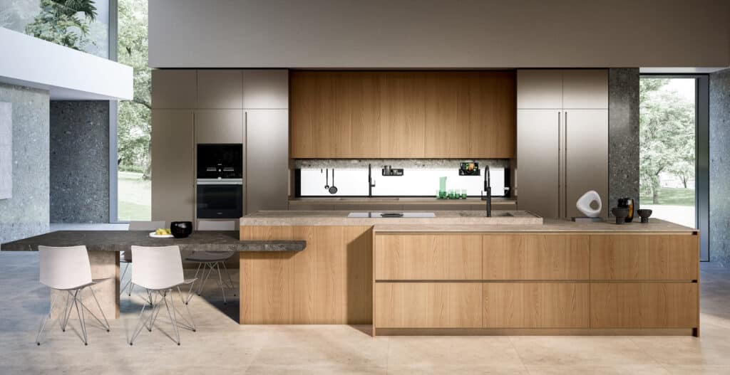 Large luxury kitchen in contemporary home with cabinets in light wood and a silver metallic lacquer.