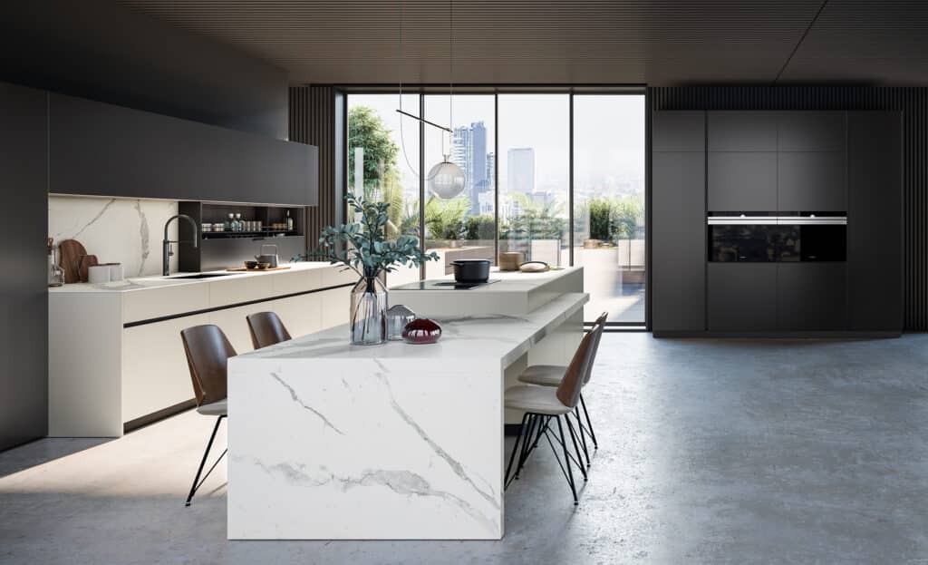 Luxury modern kitchen in black and white micalized lacquers with large island.