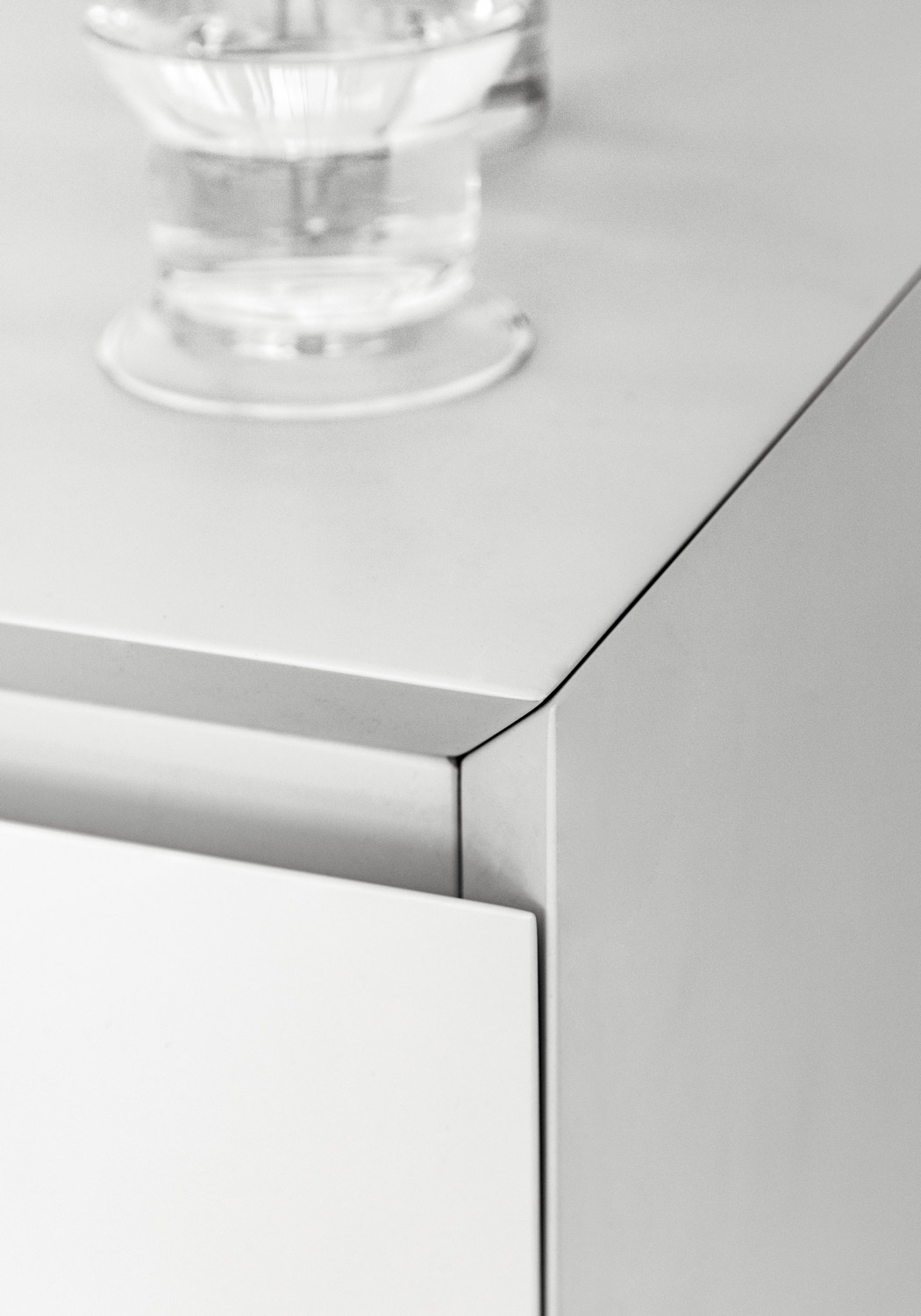 A 30⁰ angled profile was used on cabinet doors, sides, and countertop. 