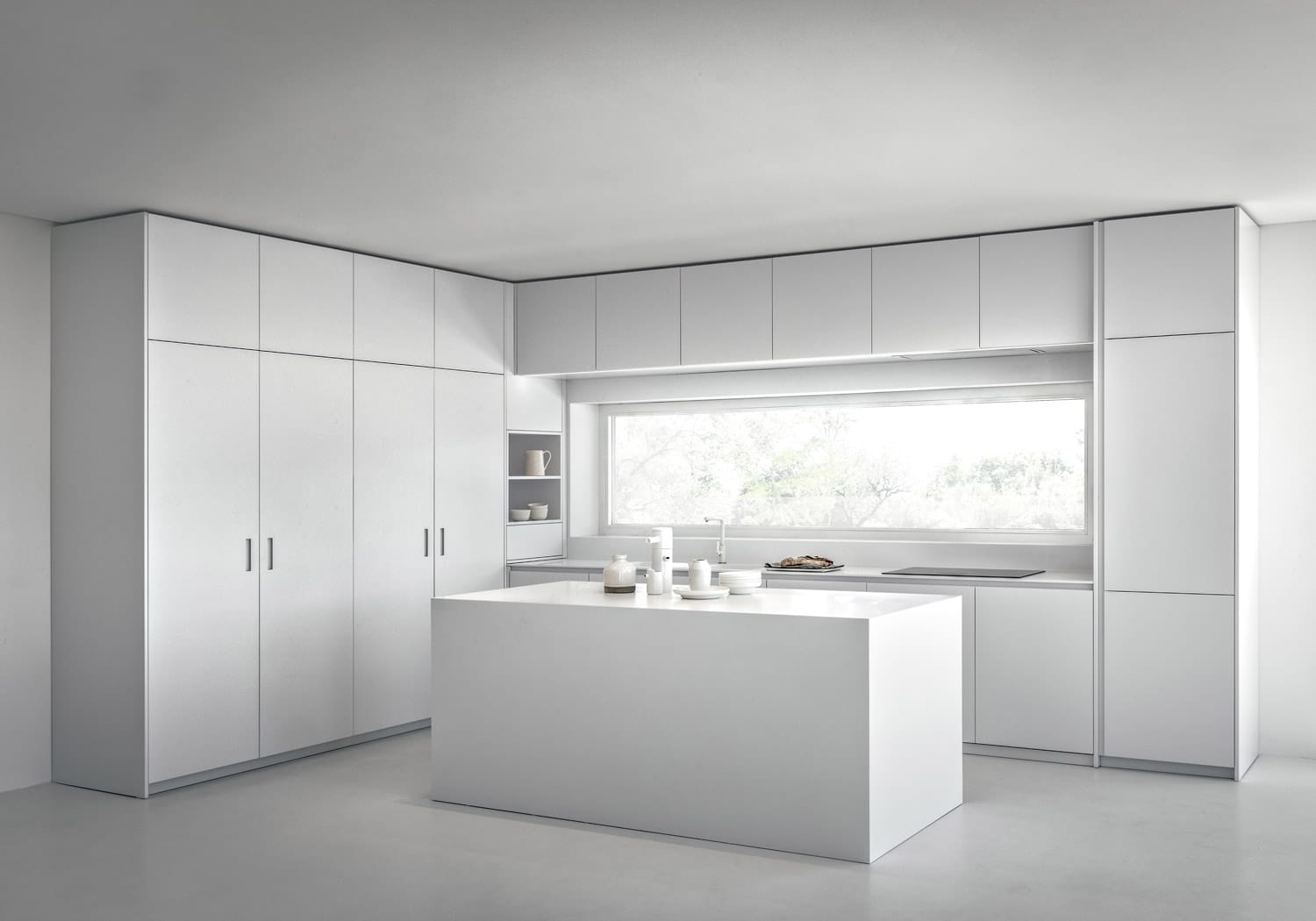 The purity of white was used in this design to create an aesthetically graceful and luminous kitchen. 