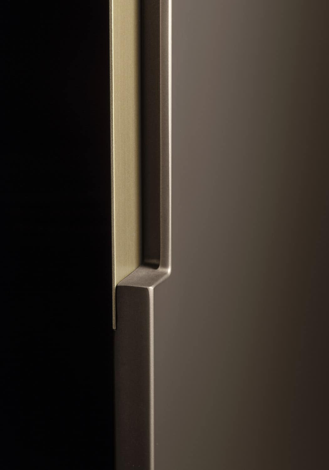 Step handles with Antique Brass laquered metal finish were used on tall units and pocket doors to facilitate opening.