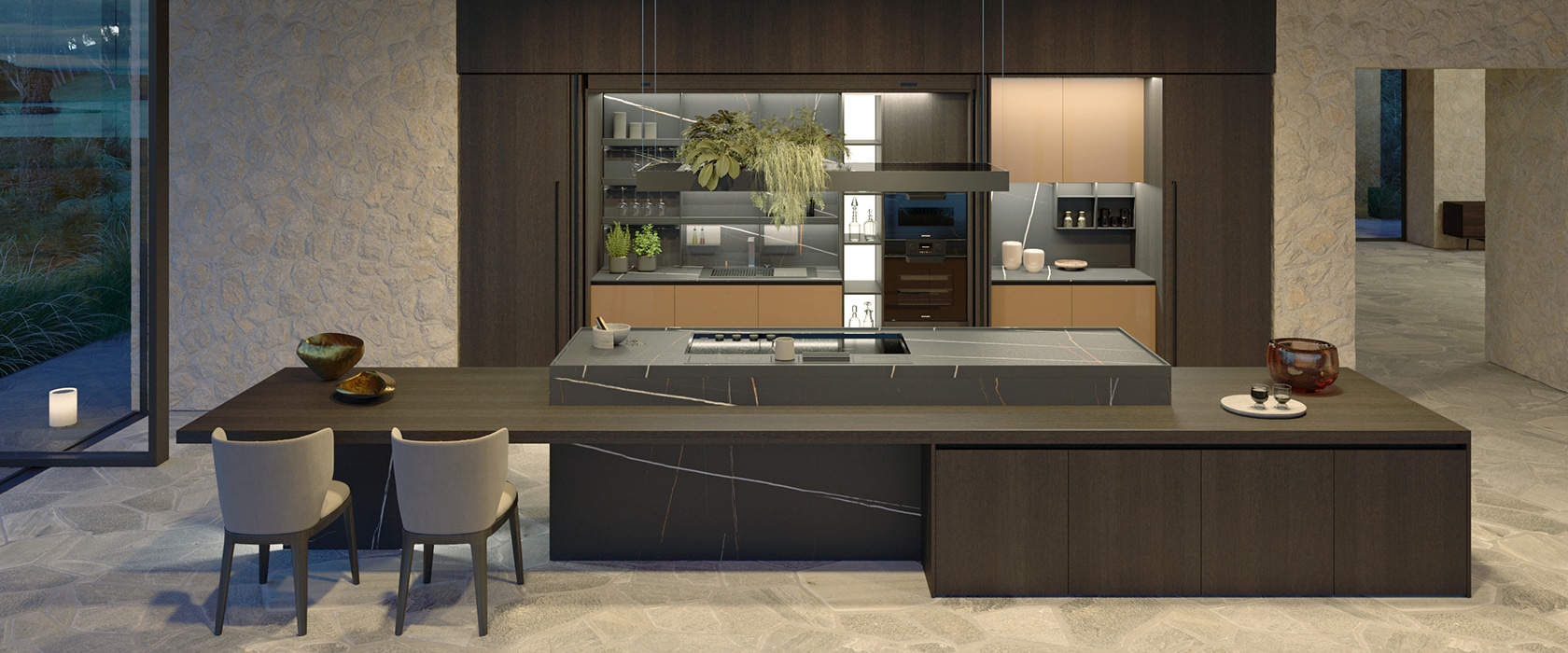 Large luxury kitchen with oversized island in dark oak wood.