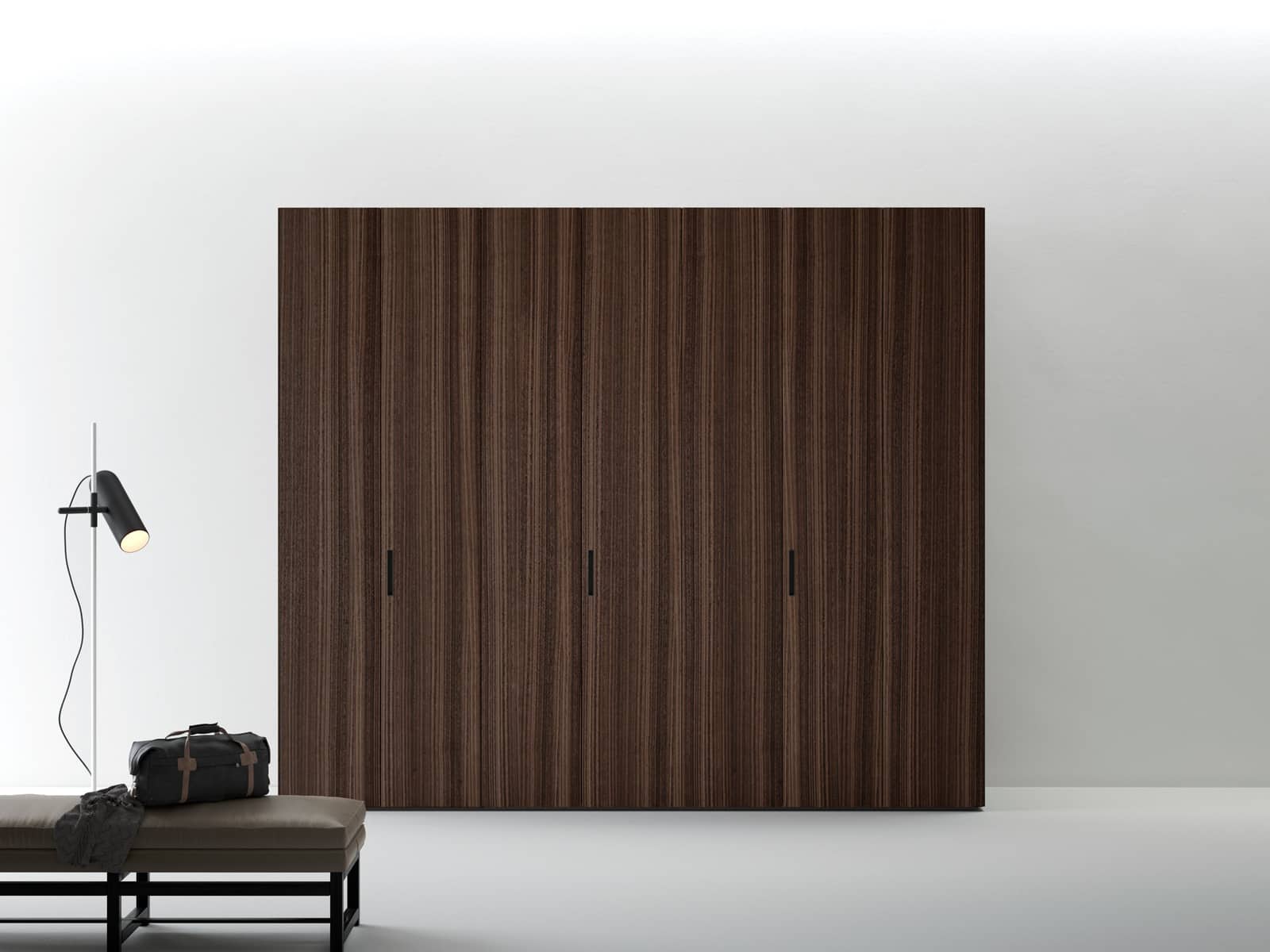 This hinged-door wardrobe in Eucalyptus wood infuses the room with its essence while making the most of your wall space. ⁠