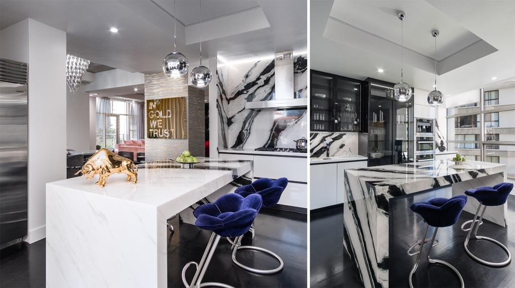 Modern kitchen with black and white marble countertops and a gold bull sculpture. Modern kitchen with black and white marble countertops and a gold bull sculpture.