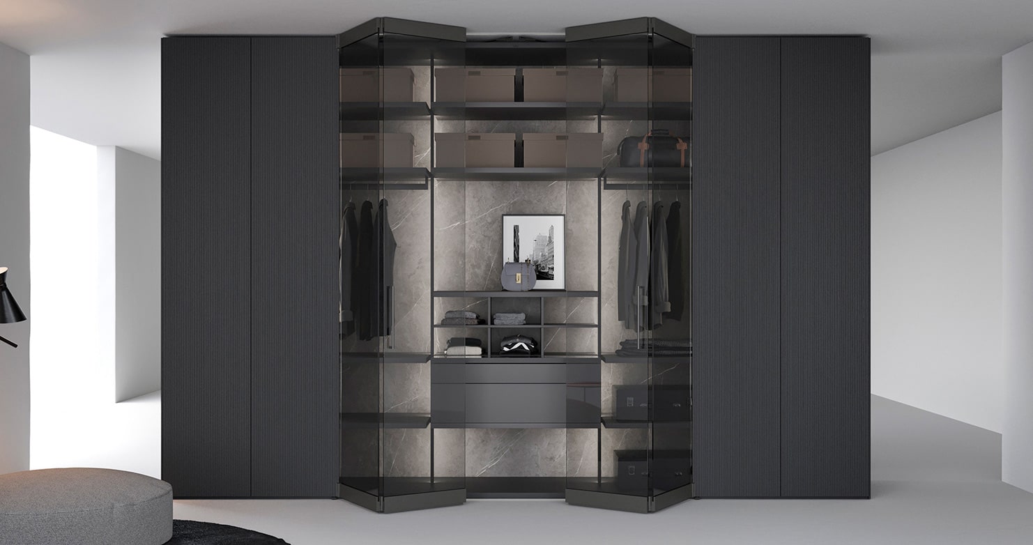 Luxury closet with grey ceramic interiors, dark wood and smoked glass doors