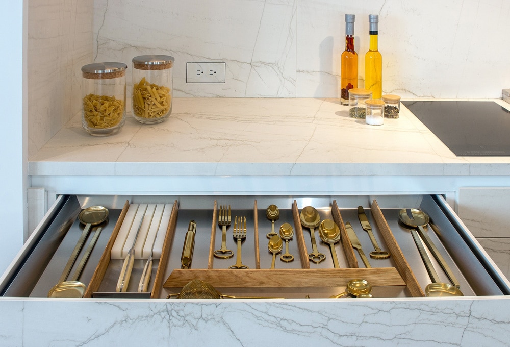 Luxury kitchen drawer, counter and backsplash in Neolith Mont Blanc